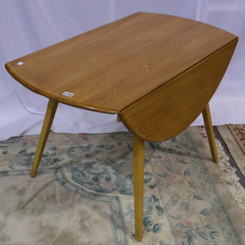 2106 - Ercol blonde elm Quaker dining suite comprising a circular drop leaf table (D: 114 cm, H: 72 cm), an... 