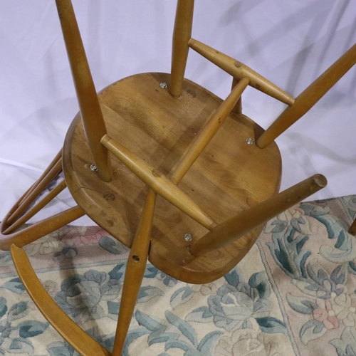 2107 - Pair of Ercol blonde elm Windsor elbow chairs, one with repairs to backrest. Not available for in-ho... 