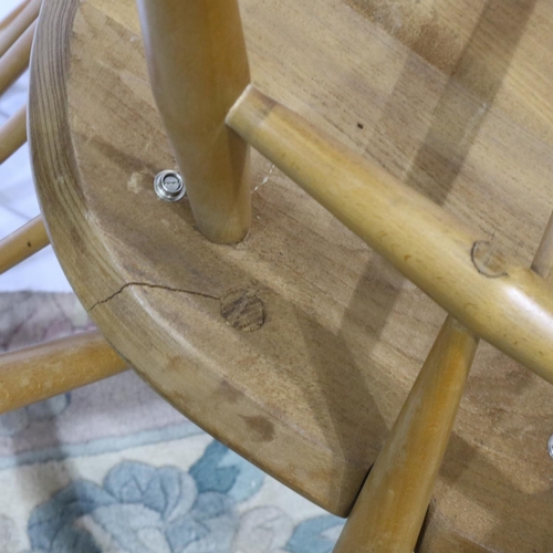 2107 - Pair of Ercol blonde elm Windsor elbow chairs, one with repairs to backrest. Not available for in-ho... 