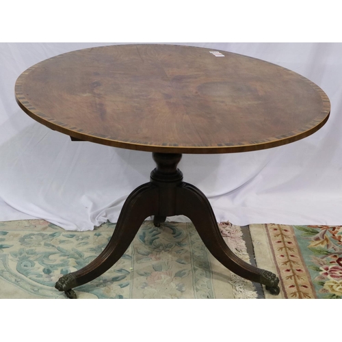 2126 - Victorian oval mahogany breakfast table, with hinged tilt-top raised on a quadripartite carved base,... 