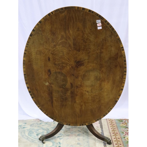 2126 - Victorian oval mahogany breakfast table, with hinged tilt-top raised on a quadripartite carved base,... 