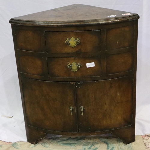 2128 - Early 19th century floor standing corner cupboard, having two short drawers and two cupboard doors, ... 