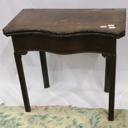 2138 - A late 18th century mahogany fold-over card table with serpentine front, 84 x 45 x 75 cm H (closed).... 