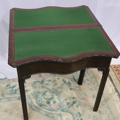 2138 - A late 18th century mahogany fold-over card table with serpentine front, 84 x 45 x 75 cm H (closed).... 