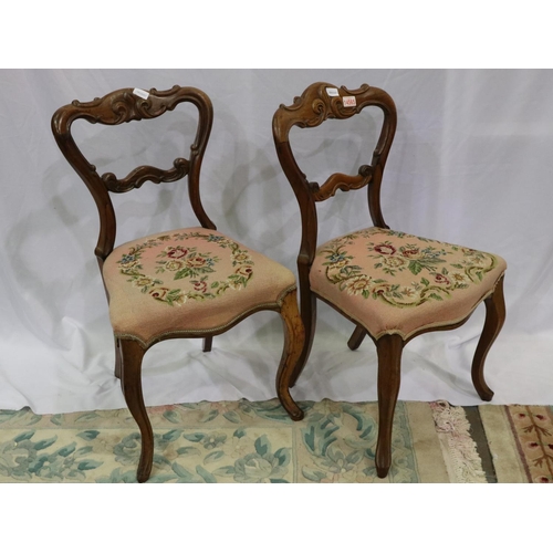 2141 - Pair of early Victorian walnut crown back chairs with wool work seats. Not available for in-house P&... 