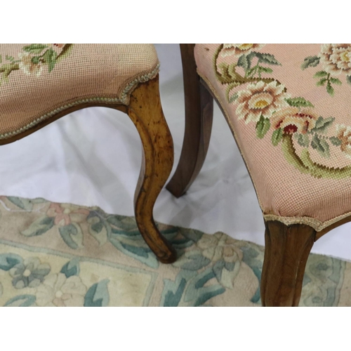 2141 - Pair of early Victorian walnut crown back chairs with wool work seats. Not available for in-house P&... 