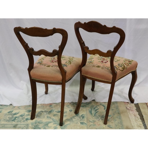 2141 - Pair of early Victorian walnut crown back chairs with wool work seats. Not available for in-house P&... 