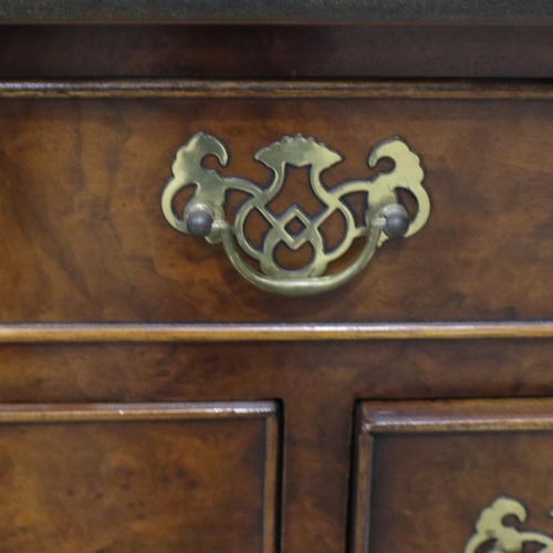 2143 - 20th century reproduction feather-banded walnut lowboy of four drawers, 76 x 45 x 76 cm H. Not avail... 