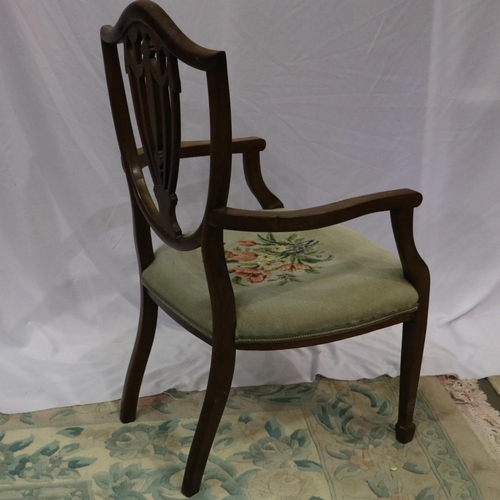 2144 - Early Victorian walnut shield back gentlemans elbow chair with wool work upholstered seat. Not avail... 