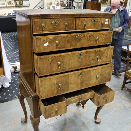 2152 - An early 18th century banded walnut chest-on-stand, having two-short and three graduating long drawe... 