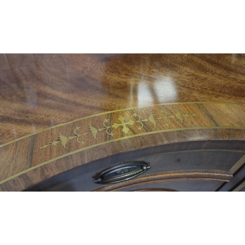 2158 - A 20th century brass inlaid walnut sideboard, serpentine-front, with two bowed drawers flanked by tw... 