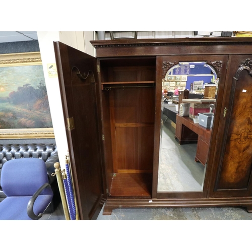 2159 - Substantial 19th century three door flame mahogany wardrobe, interior fitted with drawers and hangin... 