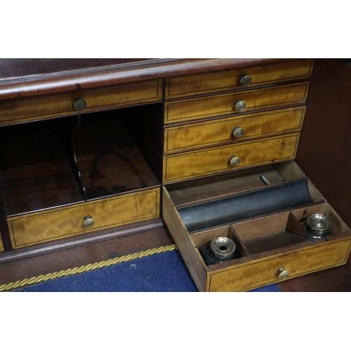 2160 - A monumental 19th century secretaire, the single fitted drawer sits on four turned supports and bene... 