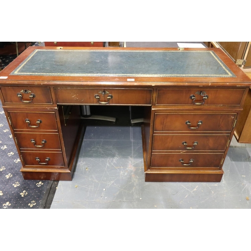 2161 - A reproduction mahogany twin-pedestal desk, with leather inset top, each pedestal with cupboards sui... 