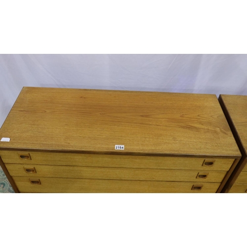 2164 - Alfred Cox: two mid 20th century teak chests of four graduated long drawers, largest 107 x 44 x 71 c... 