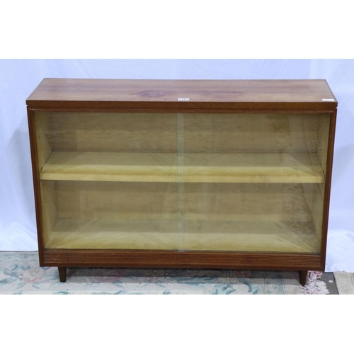 2165 - Mid 20th century teak bookcase with twin glass sliding doors, 107 x 31 x 75 cm H, some staining to t... 