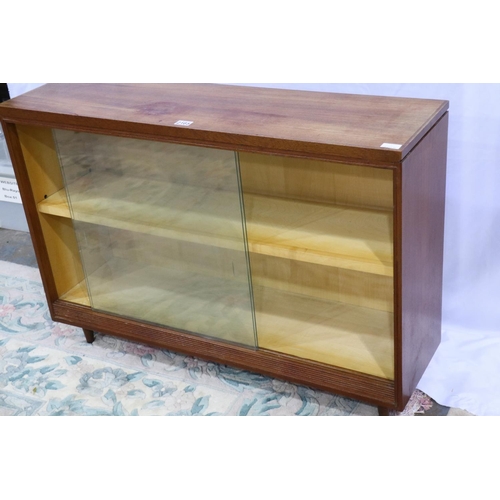 2165 - Mid 20th century teak bookcase with twin glass sliding doors, 107 x 31 x 75 cm H, some staining to t... 