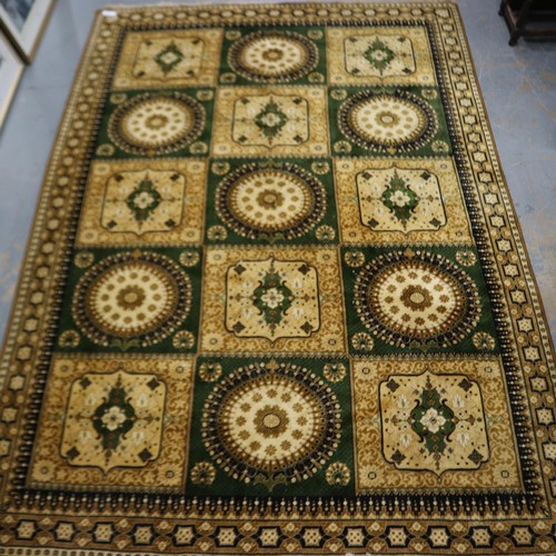 2093 - Late 20th Century Carmel Carpets of Israel large area rug of geometric repeating shapes on a green a... 