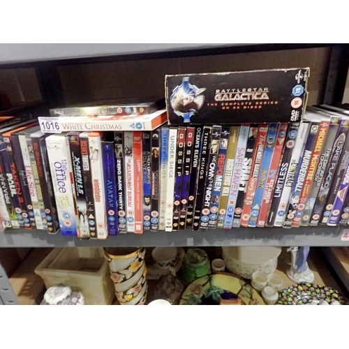 1016 - Shelf of mixed DVD's. Not available for in-house P&P