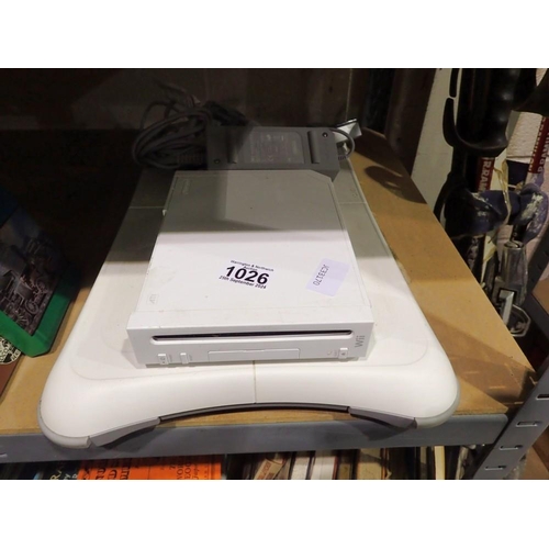 1026 - Nintendo Wii with sensor, PSU, connectors and board. All electrical items in this lot have been PAT ... 