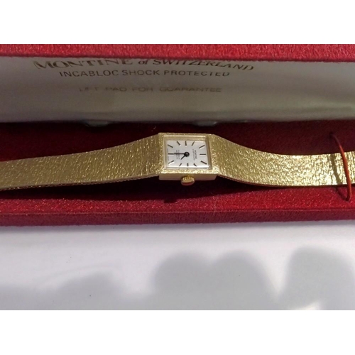 1065 - Ladies wristwatch, by Montine of Switzerland, in a red case. UK P&P Group 1 (£16+VAT for the first l... 