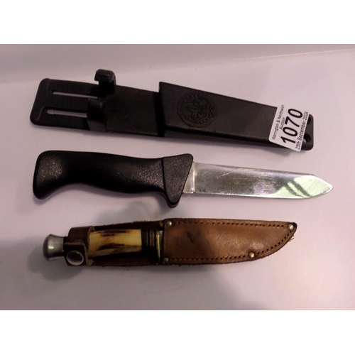 1070 - Small Sheffield made, horn handled sheath knife and a Spanish made Aitor tactical knife in a rubber ... 