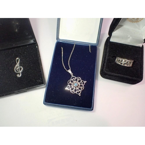 1075 - Silver numbers ring, silver pendant and a clef brooch. UK P&P Group 1 (£16+VAT for the first lot and... 