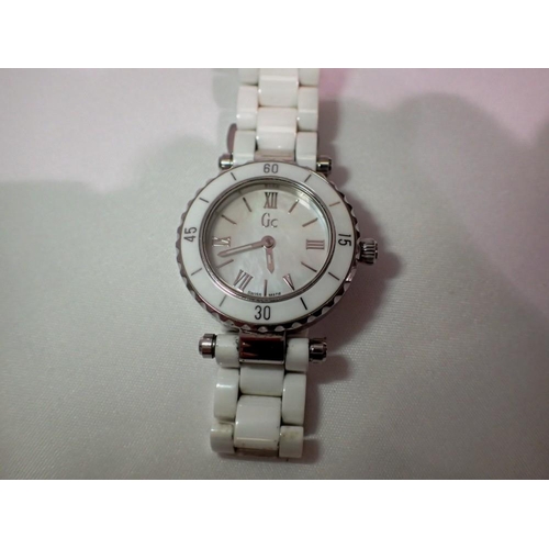 1134 - Guess collection (GC) ladies wristwatch on a ceramic bracelet. UK P&P Group 1 (£16+VAT for the first... 