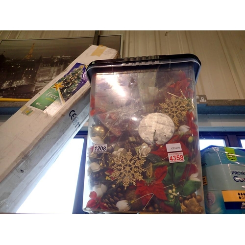 1208 - Large plastic storage box full of Christmas decorations. Not available for in-house P&P