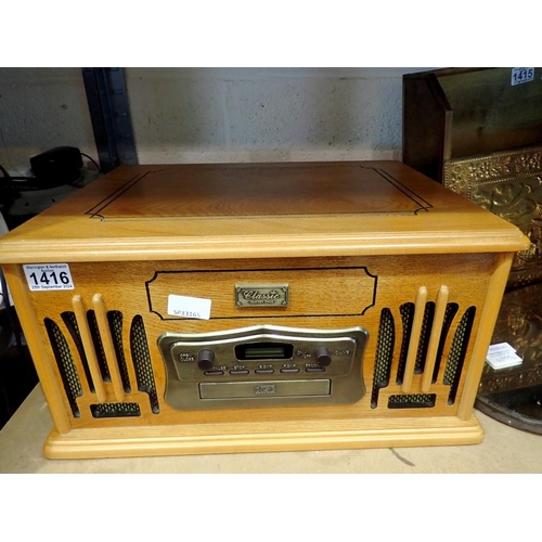 1416 - Classic Model #9809 CD/cassette/record player, tested and working. All electrical items in this lot ... 