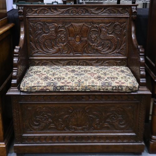 2177 - Heavily carved box pew with upholstered seat cushion, 87 x 45 x 97 cm H. Not available for in-house ... 