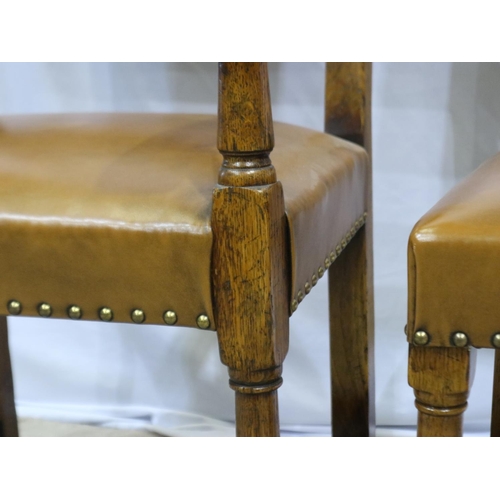 2198 - Set of six (4+2) oak framed studded and upholstered dining chairs, damage to one back-rest. Not avai... 