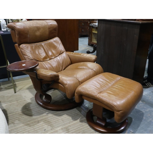 2202 - Ekornes Stressless reclining lounge chair in tan leather, with associated footstool, in the Mayfair ... 