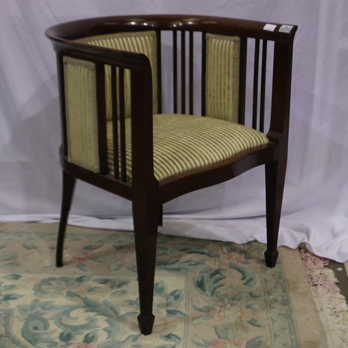 2205 - An Edwardian style mahogany framed tub chair, with upholstered panels and seat. Not available for in... 