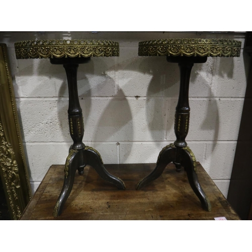 2207 - A matched pair of reproduction kingwood tripod wine tables, each with circular marble top and brass ... 