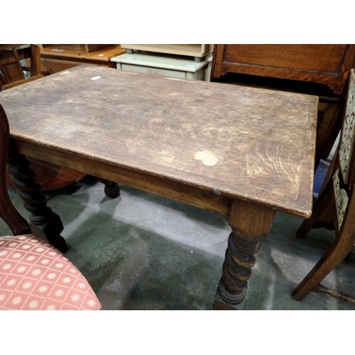 1688 - Dark oak kitchen table raised on chunky barley twist supports, 107 x 67 x 73cm H. Not available for ... 