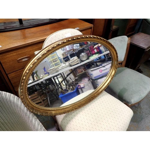 1700 - Oval gilt framed mirror, 74 x 47 cm H. Not available for in-house P&P