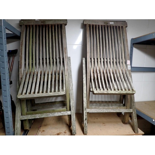 1765 - Two teak, Danish Scancraft folding garden chairs. Not available for in-house P&P