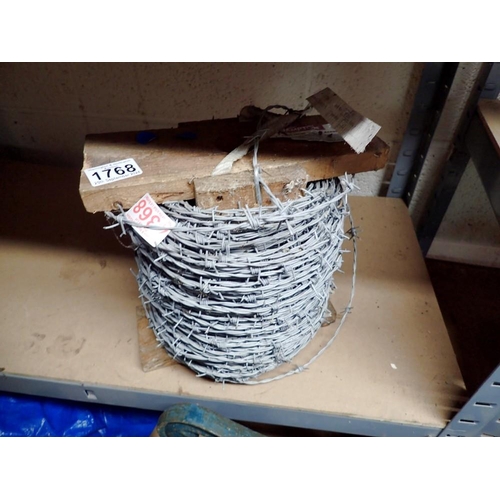 1768 - 200M roll of high tensile barbed wire. Not available for in-house P&P