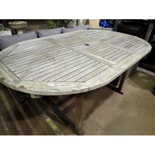 1782 - Teak oval garden table. Not available for in-house P&P