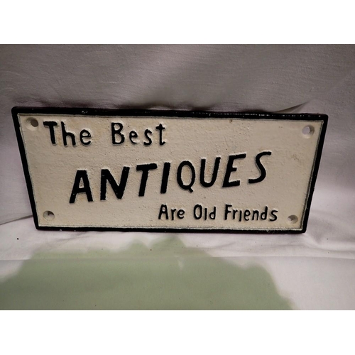 1025A - Cast iron The Best Antiques Are Old Friends sign, W: 25 cm. UK P&P Group 2 (£20+VAT for the first lo... 