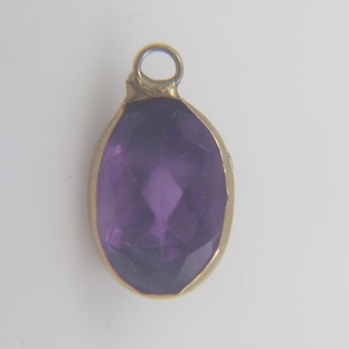 101 - Oval cut amethyst in 9ct gold bezel setting, H: 8 mm. UK P&P Group 0 (£6+VAT for the first lot and £... 