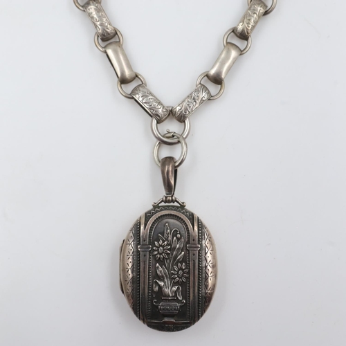 11 - Victorian hallmarked silver locket with Victorian white metal collarette, 44g. UK P&P Group 0 (£6+VA... 