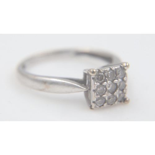 21 - 9ct white gold dress ring, with nine small diamonds in a square setting, size H/I, 1.6g. UK P&P Grou... 