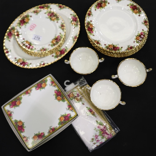 219 - Royal albert 16 piece dinner service, in the Old Country Roses pattern, plus a set of placemats and ... 