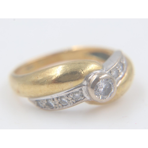 23 - 18ct gold ring, set with a central diamond and diamond shoulders, marks indistinct, size J/K, 4.9g. ... 