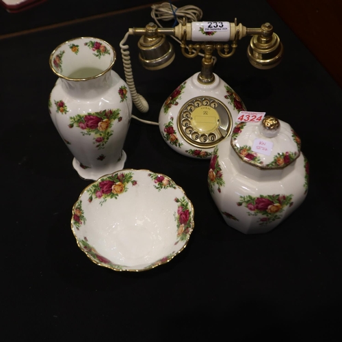 233 - Four Royal Albert items in the Old Country Roses pattern, including a vase, temple jar, footed bowl ... 