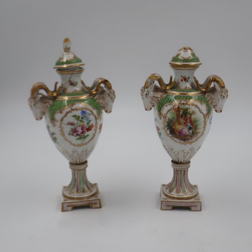 263 - Two twin handled vases and covers, cross sword marks to base, some damages noted, height 22cm (2). U... 