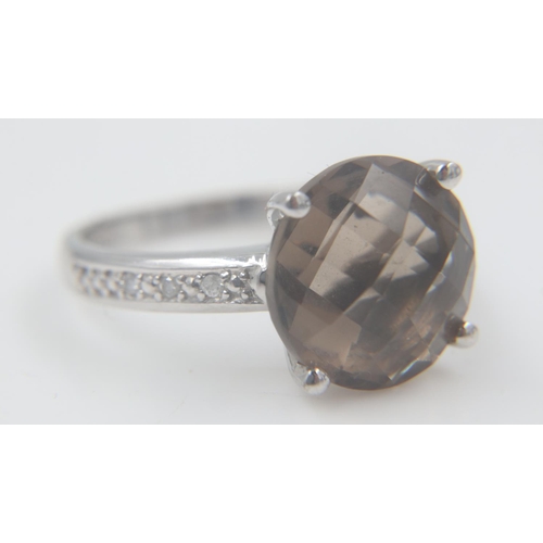 29 - 9ct white gold ring, set with smokey quartz, size M, 3.5g. UK P&P Group 0 (£6+VAT for the first lot ... 