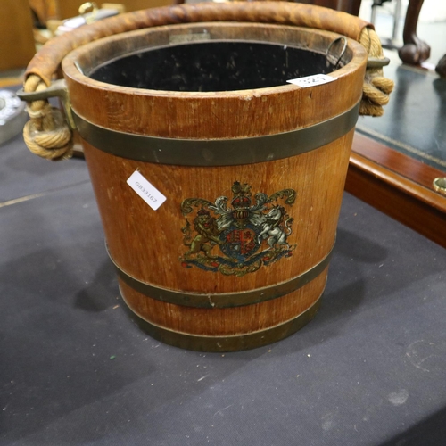 321 - Coopered pail with armorial crest, leather clad rope handle and metal liner, height 30cm. Not availa... 